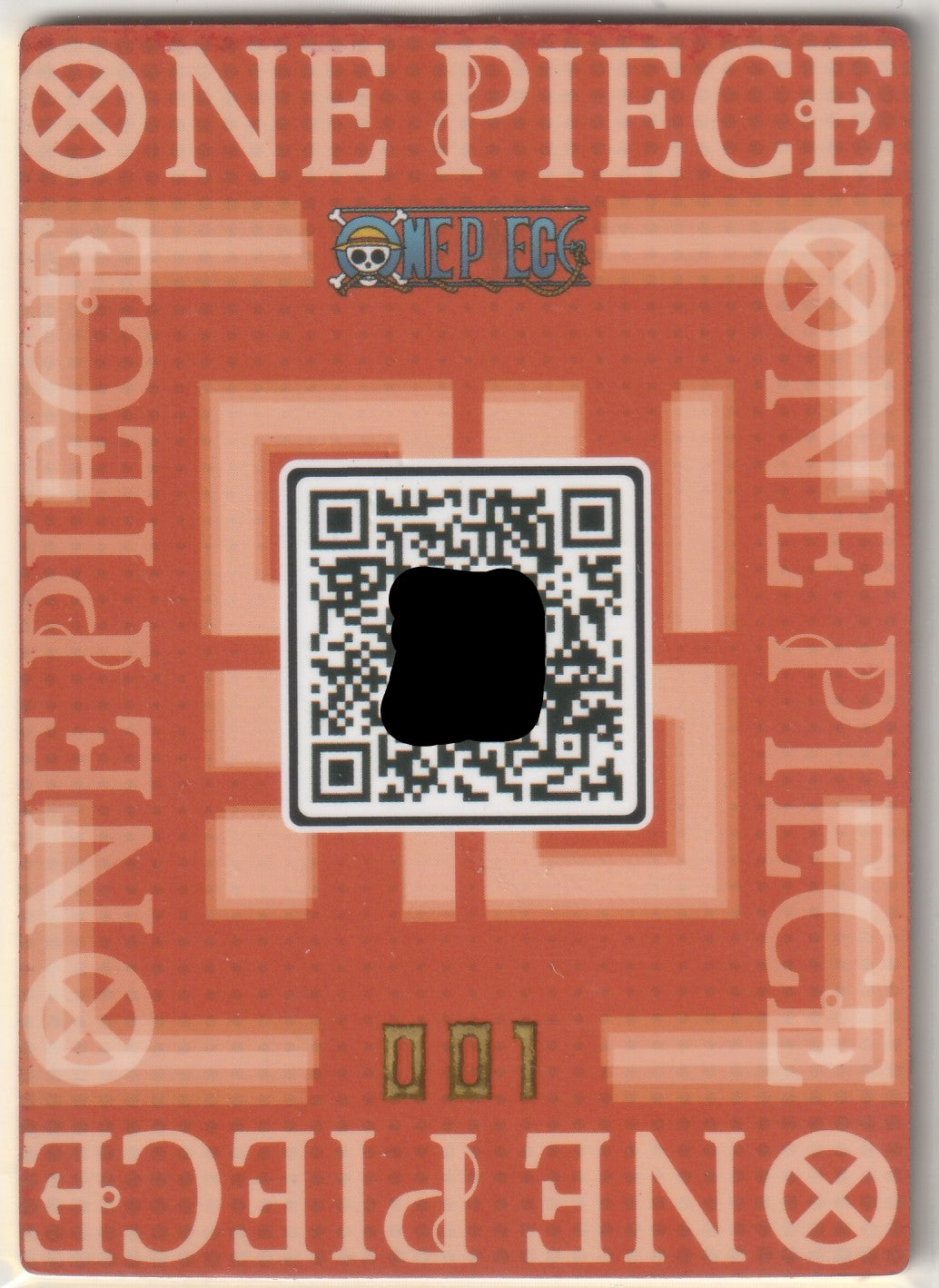 Back of One Piece card with QR code, orange background, and gold '001' numbering