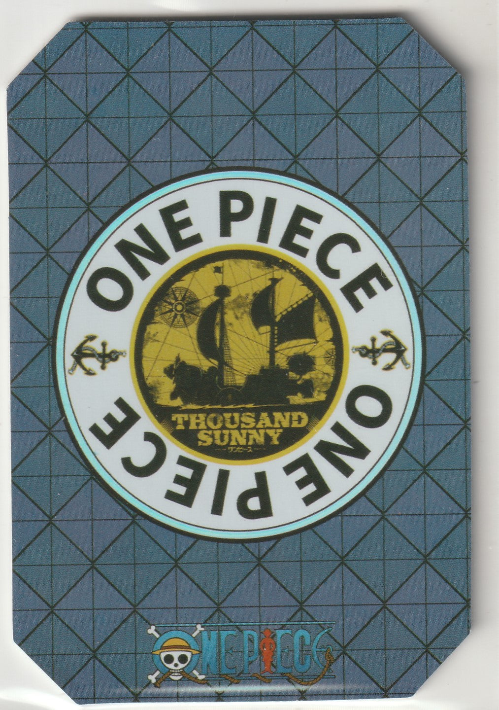 Back of One Piece OR collectible card featuring Thousand Sunny ship and One Piece logo on a blue grid pattern.