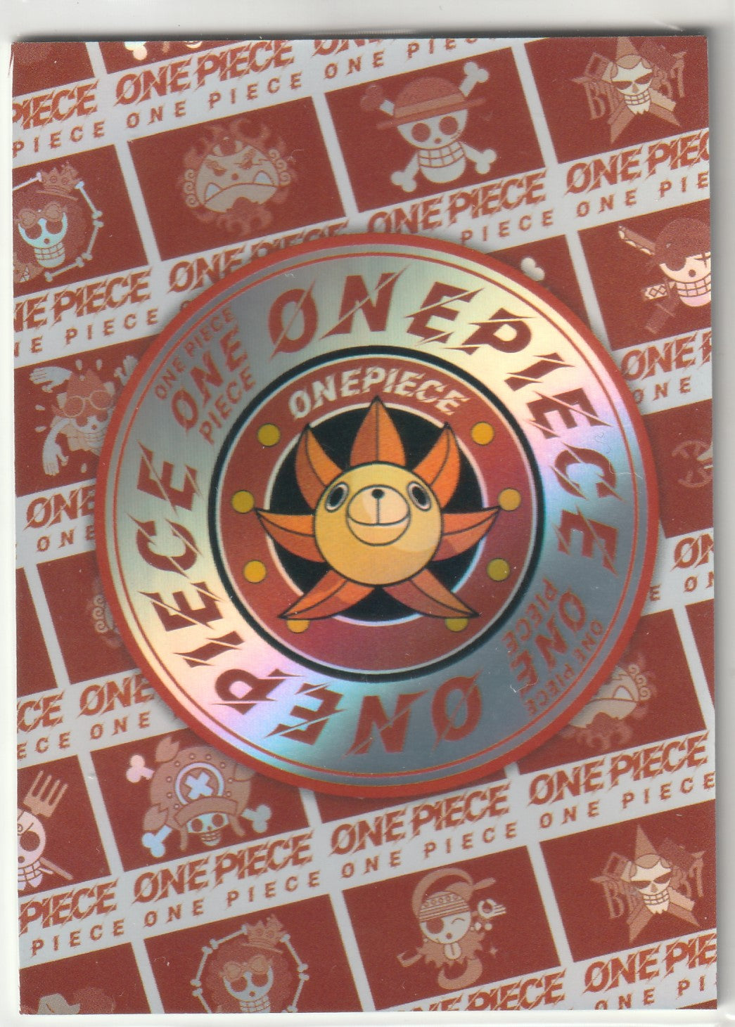 Back of One Piece PTR collectible card with Thousand Sunny emblem and holographic Straw Hat logo pattern.