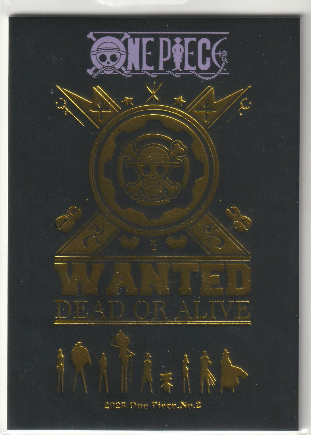 Back of One Piece collectible card with black and gold embossed design featuring the Straw Hat Pirates emblem and crew silhouettes.