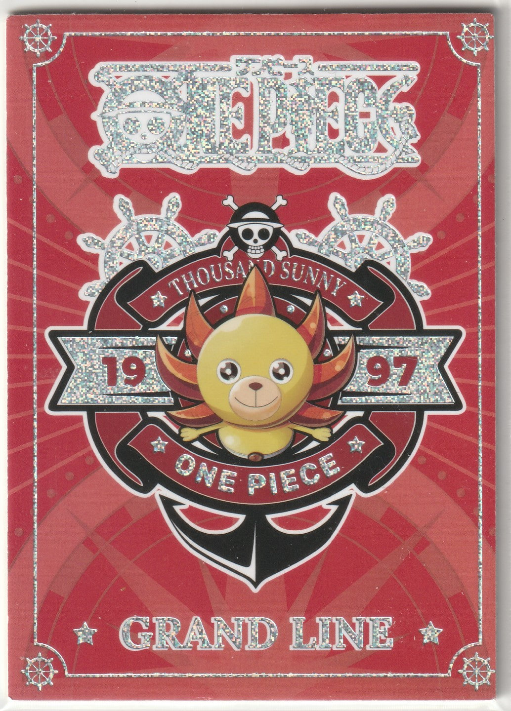 Thousand Sunny emblem from One Piece, with red and holographic print featuring the ship’s figurehead and the text "GRAND LINE."