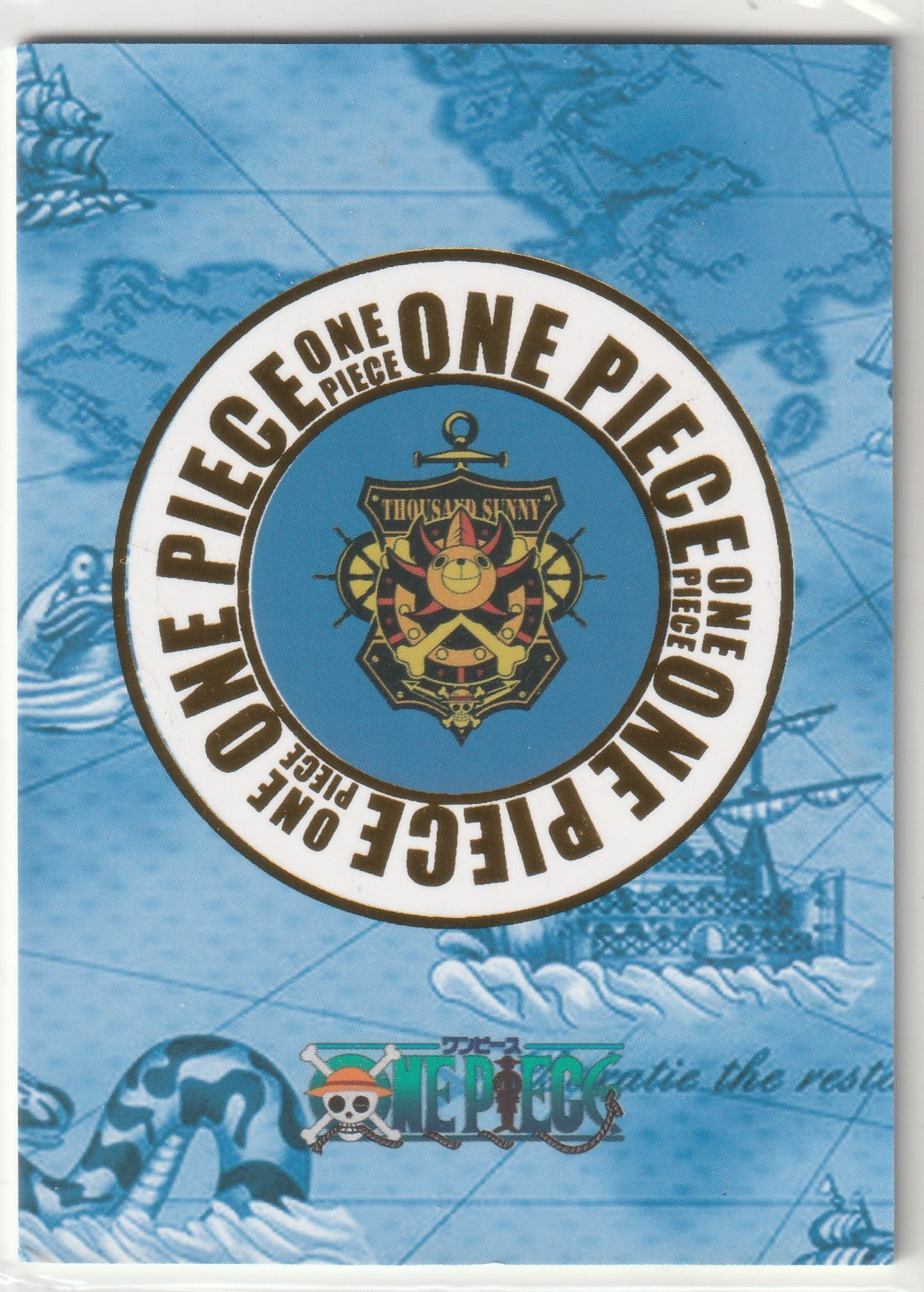 One Piece card back featuring the Thousand Sunny ship emblem and sea chart background."