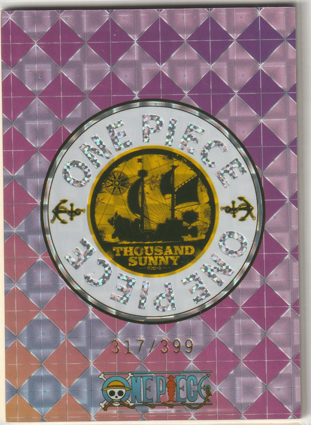 "One Piece card back with Thousand Sunny emblem, purple holographic grid design, and limited-edition marking '317/399'."