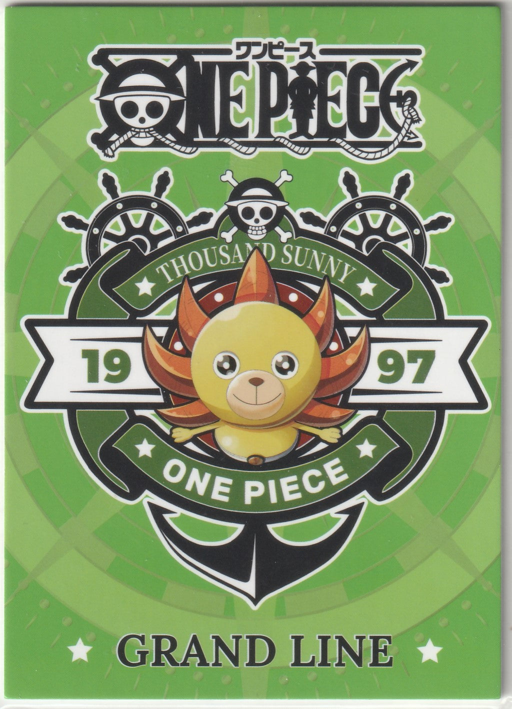 "One Piece card back featuring Thousand Sunny crest, green background, and 'GRAND LINE' text."