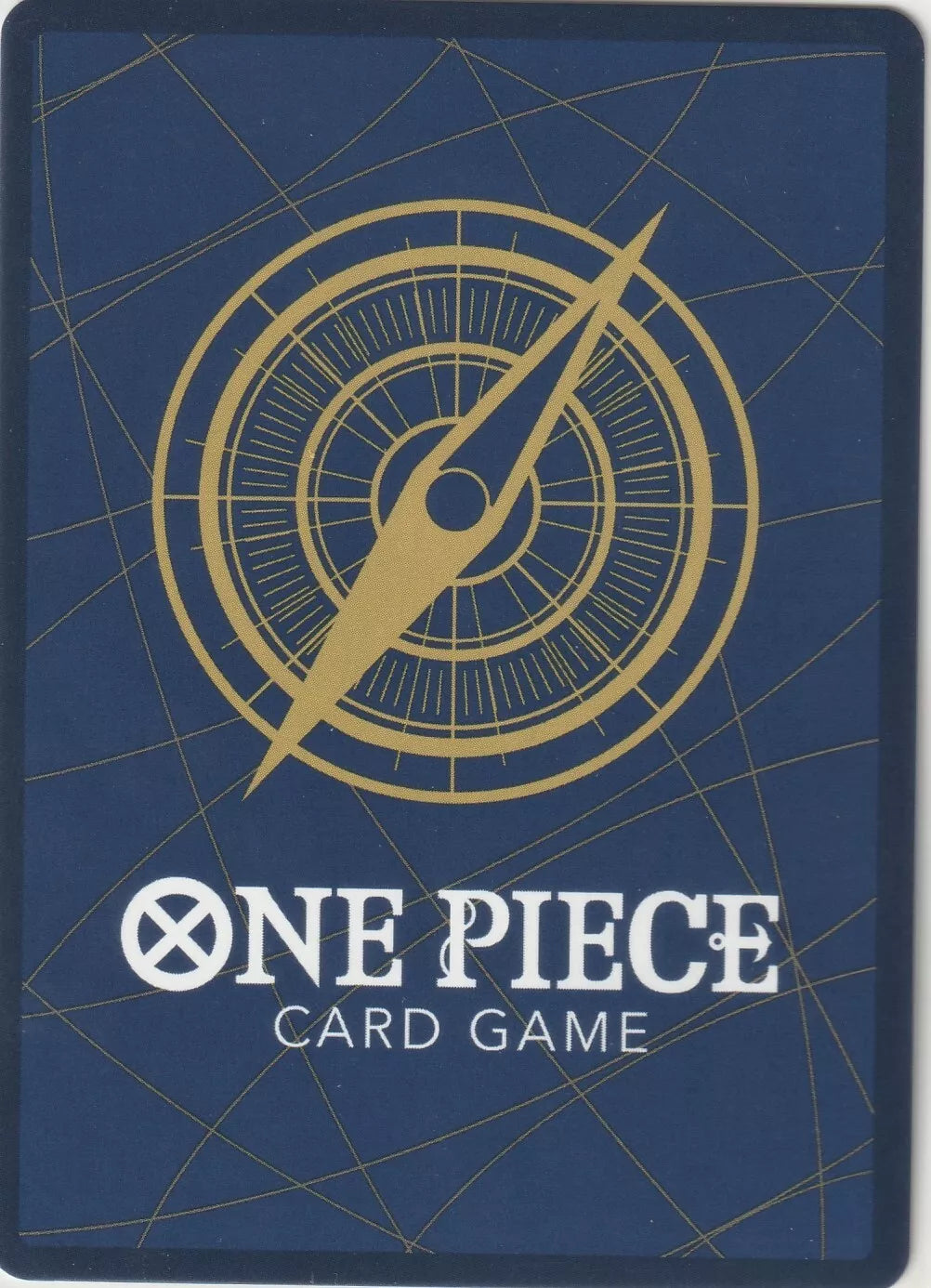 One Piece card game back design featuring a golden compass on a navy-blue background