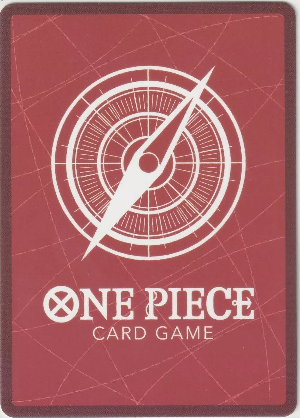 One Piece card game back design featuring a white compass on a red background.