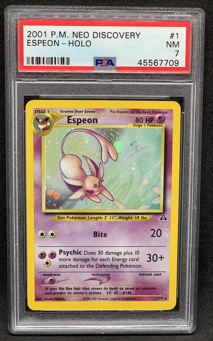 "Holographic 2001 Espeon Neo Discovery Pokémon card front view in a PSA 7 graded slab."