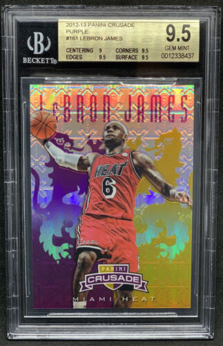 A holographic purple Prizm card featuring LeBron James dribbling in a Miami Heat uniform, graded 9.5 GEM MINT by Beckett.