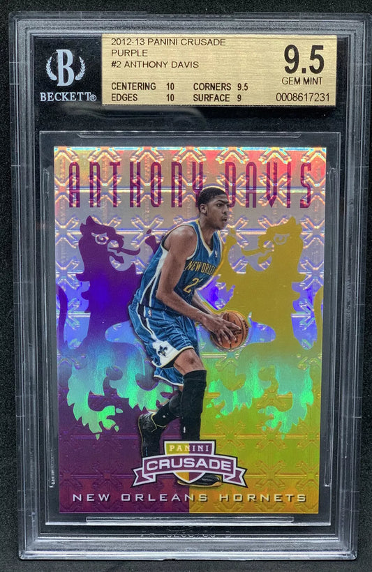 A holographic purple Prizm rookie card featuring Anthony Davis dribbling in a New Orleans Hornets uniform, graded 9.5 GEM MINT by Beckett.