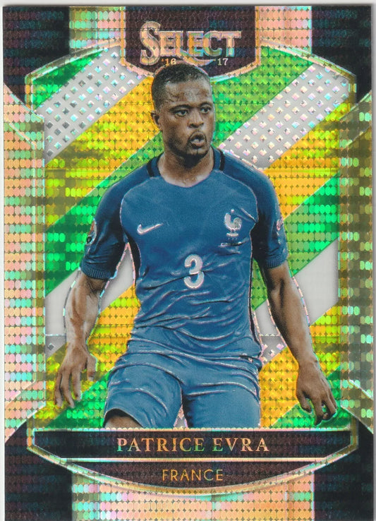 Patrice Evra in France national team kit, Panini Select multi-color prizm card design, featuring a reflective background and action pose.
