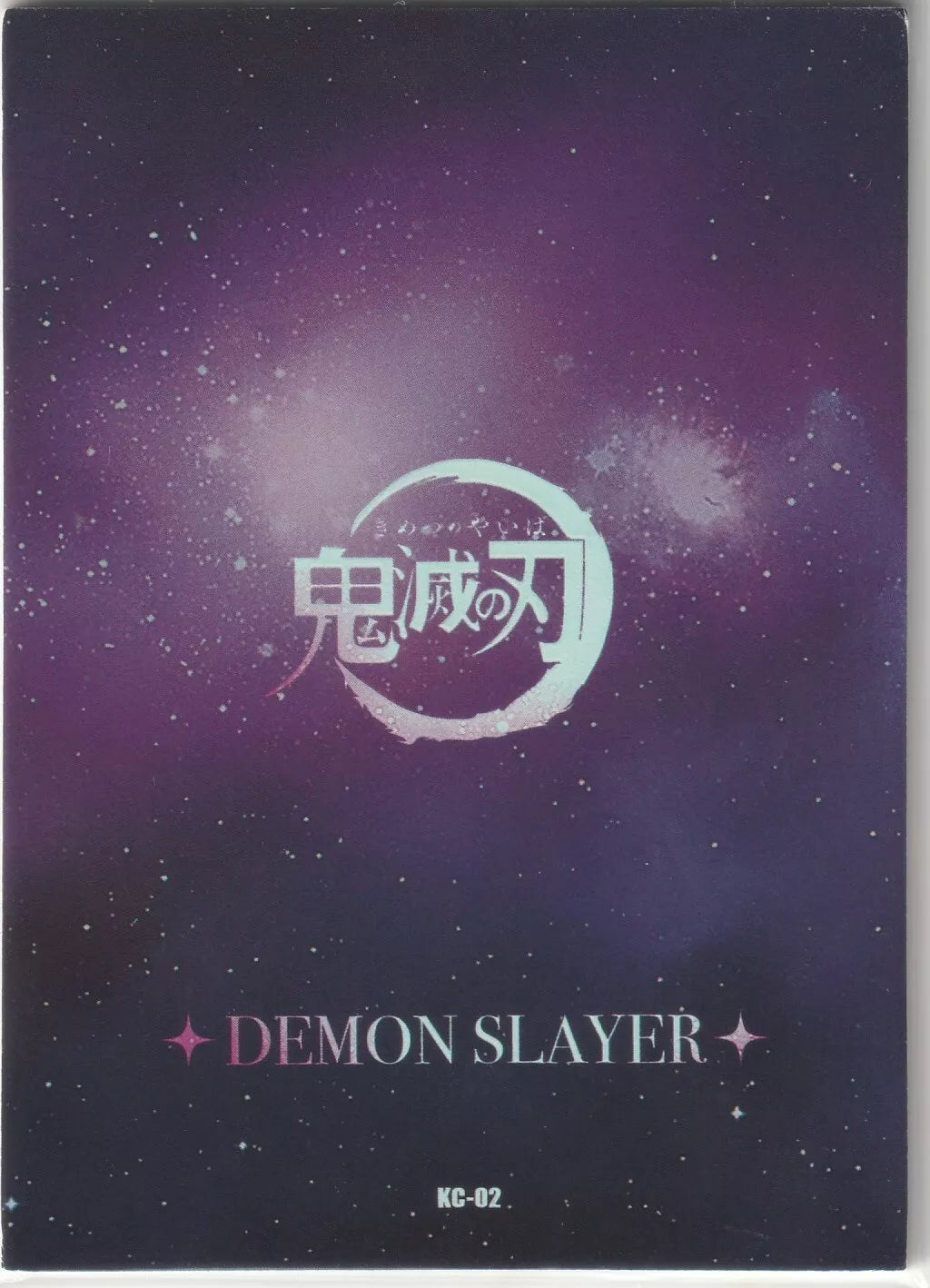 The back of the Demon Slayer KC-02 card with a cosmic purple background, stars, Kimetsu no Yaiba logo, and card number "KC-02."