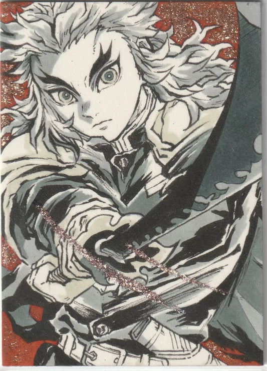 A hand-drawn sketch of Kyojuro Rengoku from Demon Slayer, wielding his sword with fiery red and gold glitter effects in the background, giving the card a dynamic and intense visual.