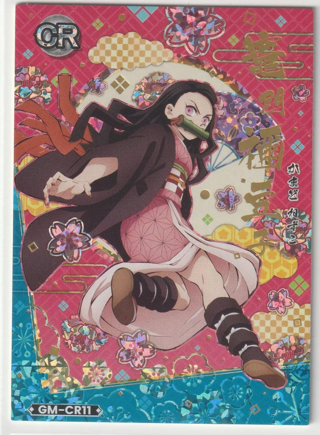 Nezuko Kamado in a dynamic action pose wearing her pink kimono, against a pink and red floral background with gold foil accents.