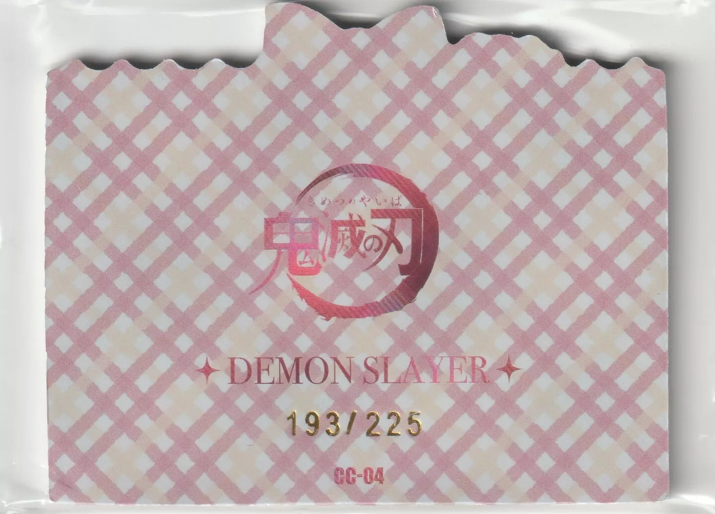 Pink and white checkered pattern with the Demon Slayer logo and serial number (193/225) in gold.