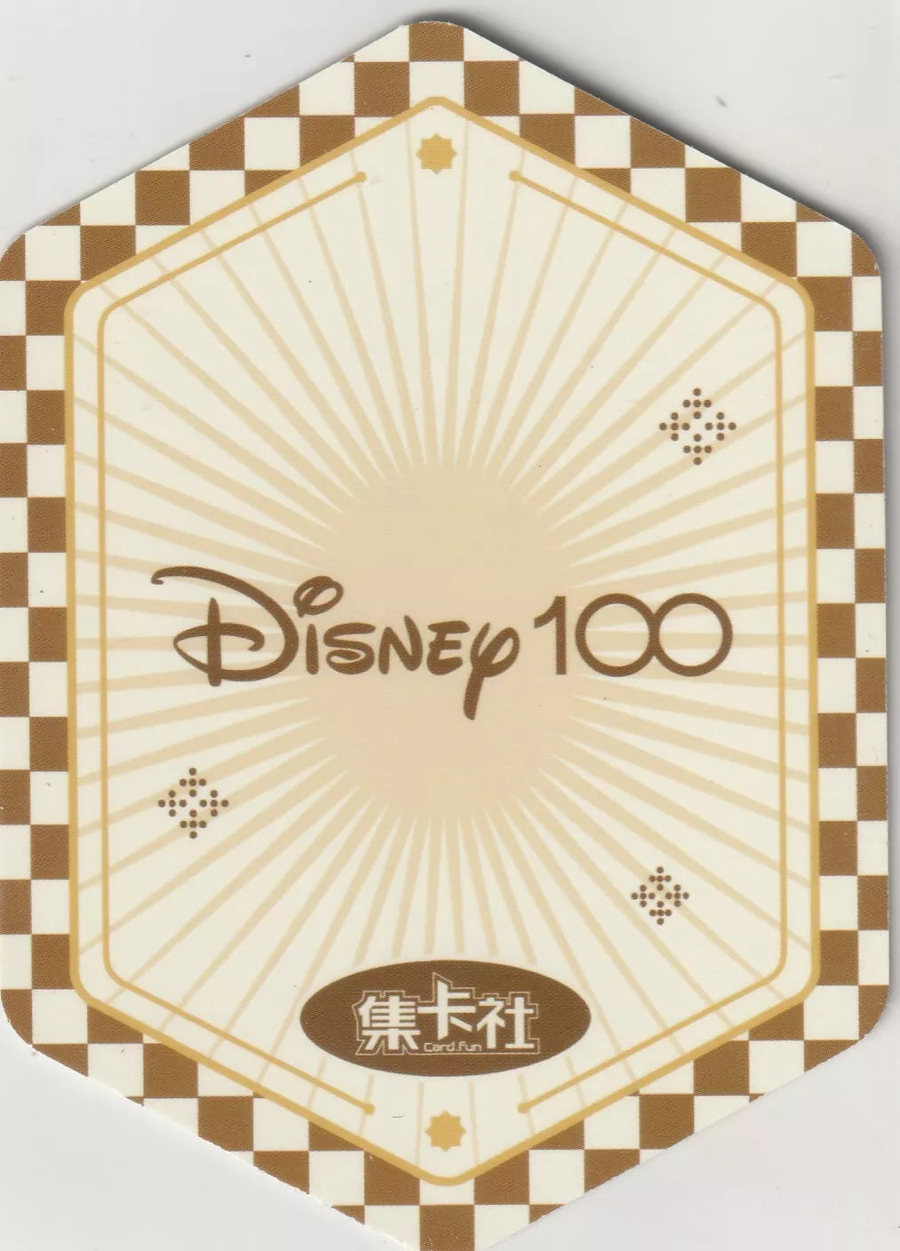 Back of the Disney 100 Alphabet Sticker featuring the Disney 100 logo with a checkerboard border and golden rays design