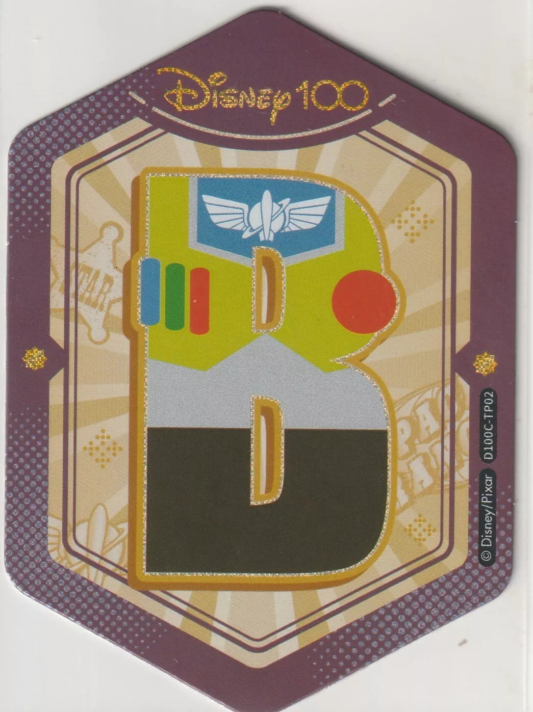 Disney 100 Alphabet Sticker featuring the letter 'B' for Buzz Lightyear from Toy Story. The design includes elements from Buzz's armor, space ranger badge, and control panel, with a purple and gold border.