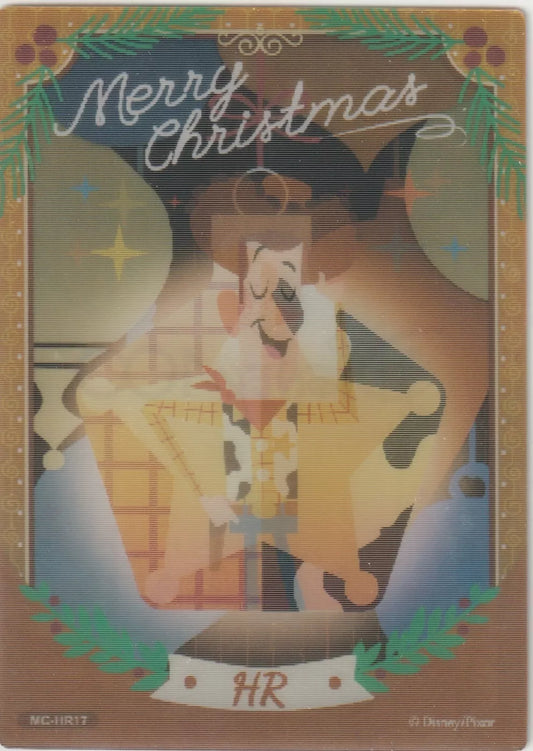 Lenticular card featuring Woody from Toy Story inside a Christmas ornament, surrounded by holiday decorations with "Merry Christmas" written at the top.