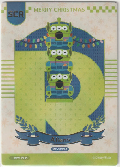 The Toy Story Aliens stacked on a green and blue background with colorful Christmas lights and a banner that says "Aliens."