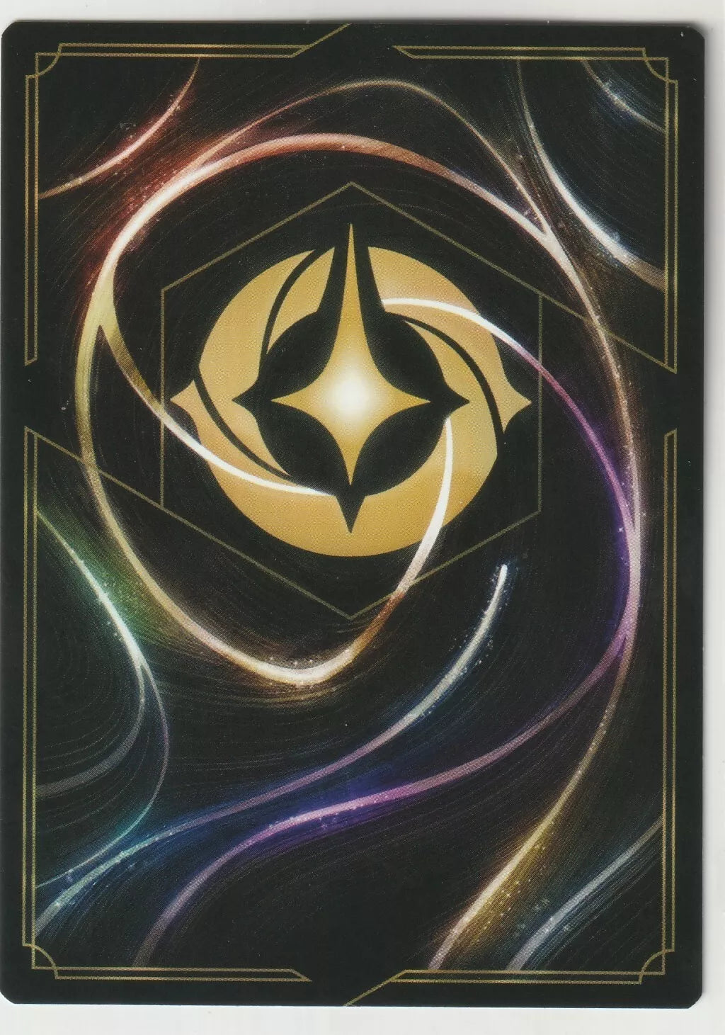 Disney Lorcana black and gold card back with swirling design and star emblem.