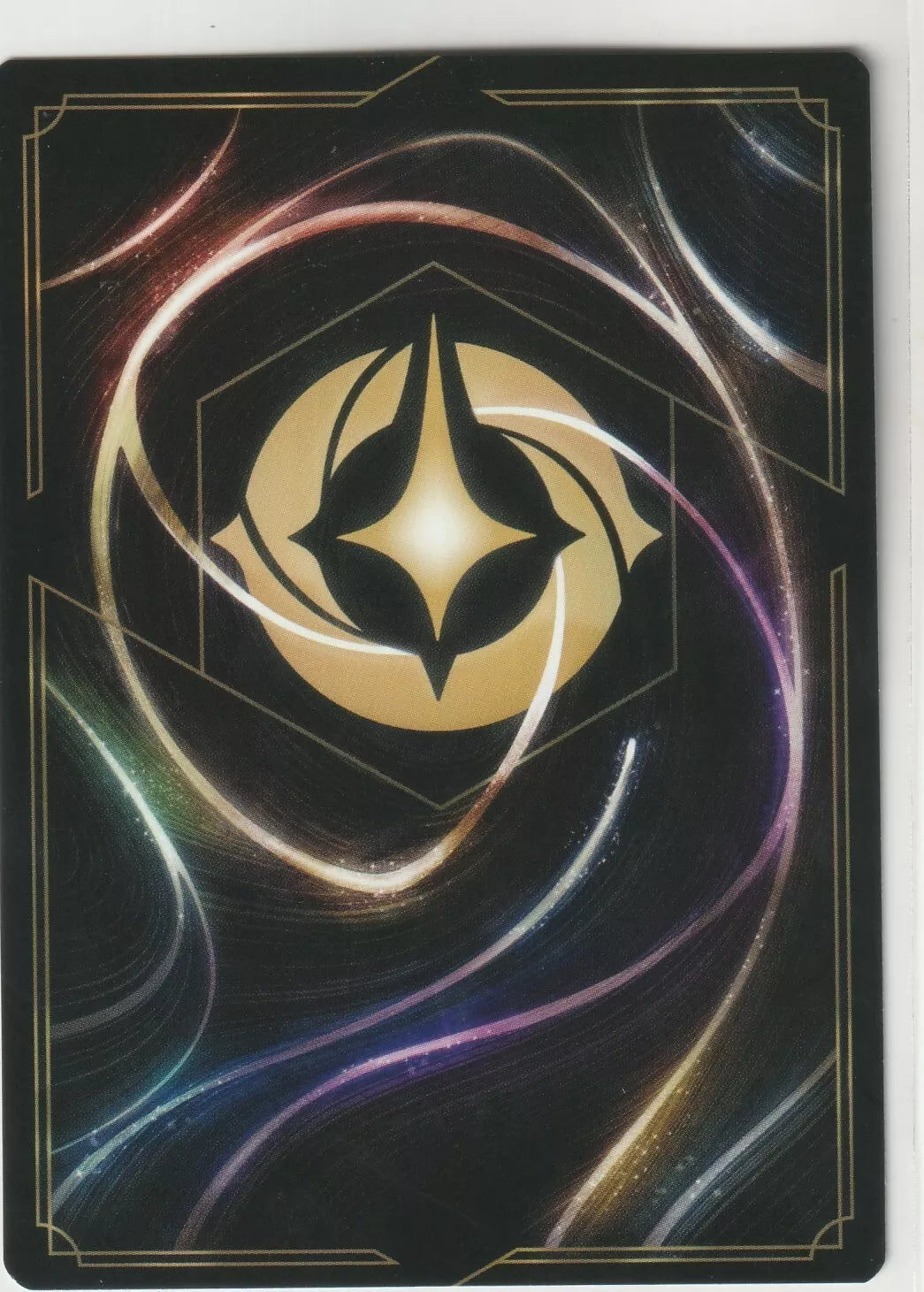 A cosmic swirl of magical energy in deep blacks, purples, and golden hues, centered on the Lorcana symbol. The design invokes a sense of mystery and fantasy, with radiant lines crossing the background like shooting stars.