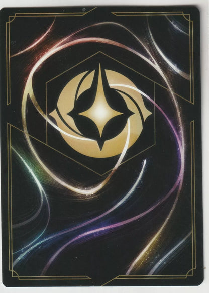 The back of a Disney Lorcana The First Chapter card, featuring swirling magical designs and the Lorcana golden symbol at the center