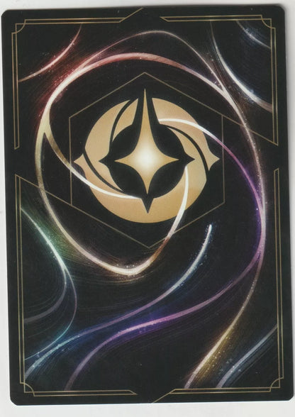 The back of a Disney Lorcana The First Chapter card, featuring swirling magical designs and the golden Lorcana symbol in the center.