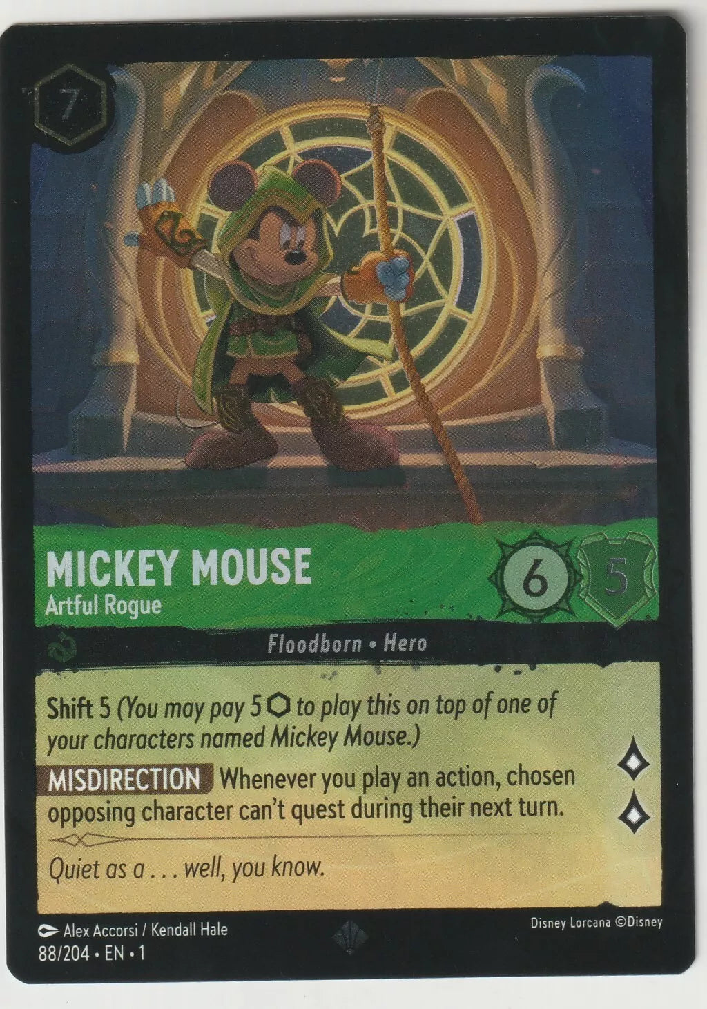 Mickey Mouse in rogue attire standing in front of a large decorative window, holding a rope, ready for action in Disney Lorcana's "Artful Rogue" card.