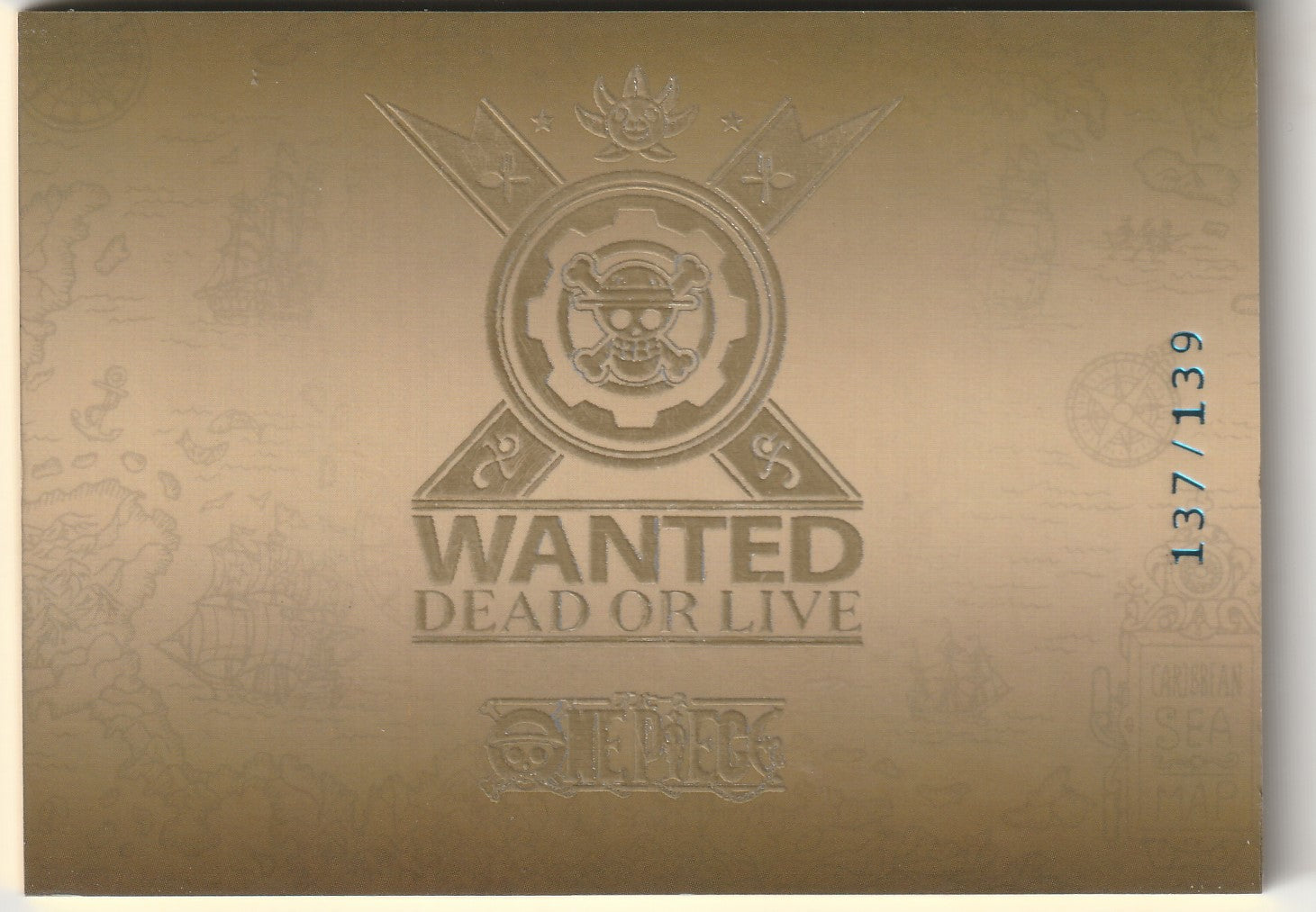 One Piece card back featuring an embossed gold 'Wanted: Dead or Alive' emblem and numbered 137/139, with detailed map patterns.