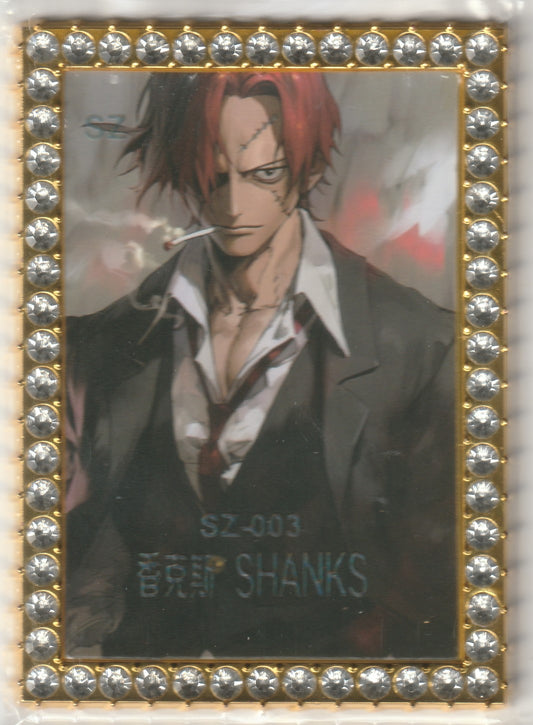 One Piece Shanks limited edition card featuring Shanks in a modern suit, framed by a gold and rhinestone border with dramatic red tones