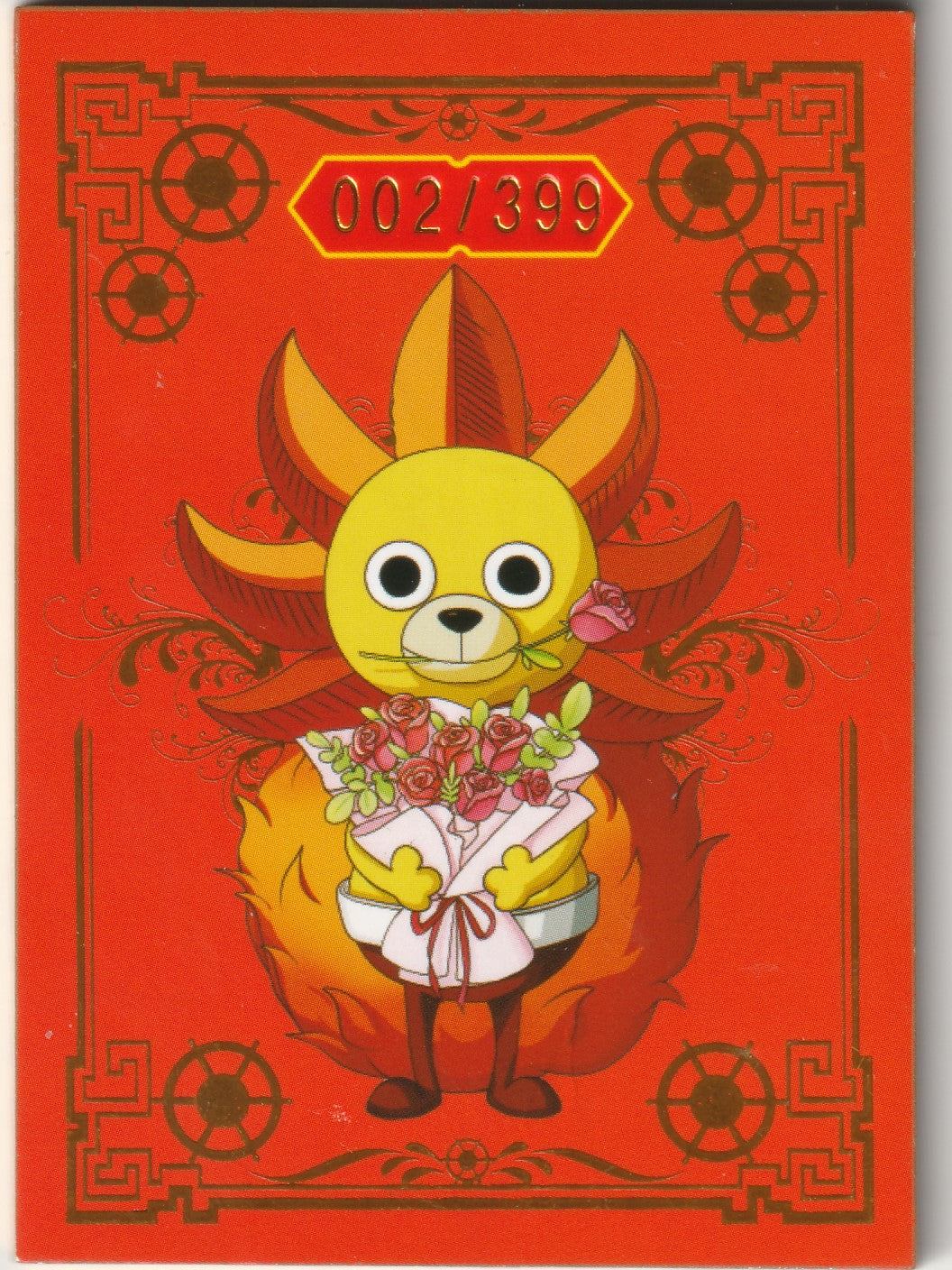 One Piece card back showcasing a vibrant red design of the Thousand Sunny holding flowers, with intricate gold detailing and serial number 002/399.