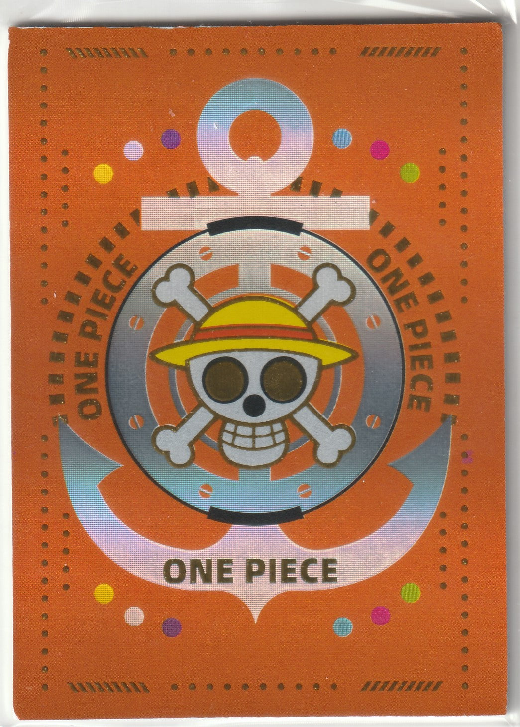 One Piece Jolly Roger with Luffy’s straw hat on an orange background with nautical motifs and anchor designs.