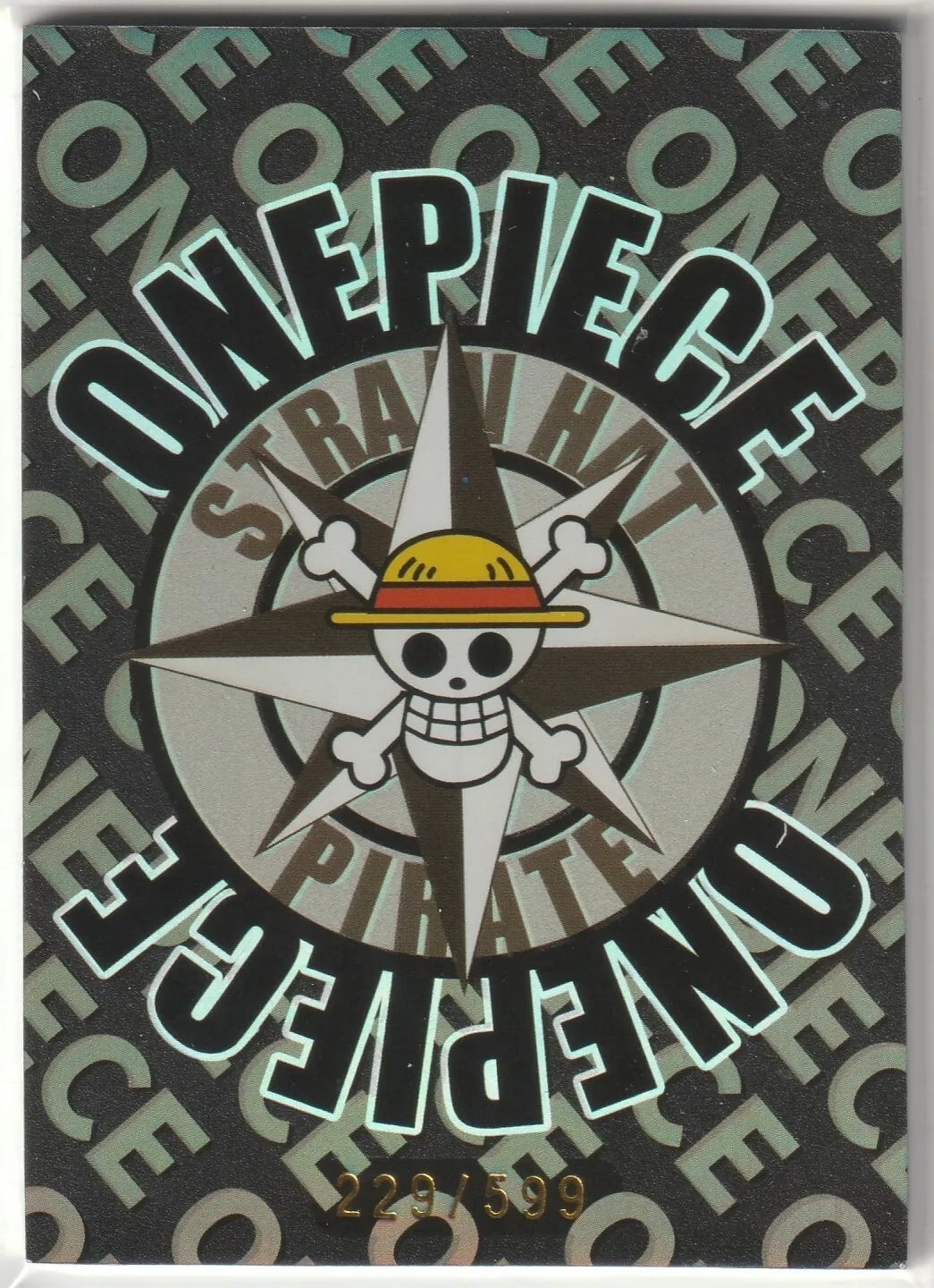 Straw Hat Pirates' logo with serial number 229/599 on a black matte background from the One Piece CBR card series.