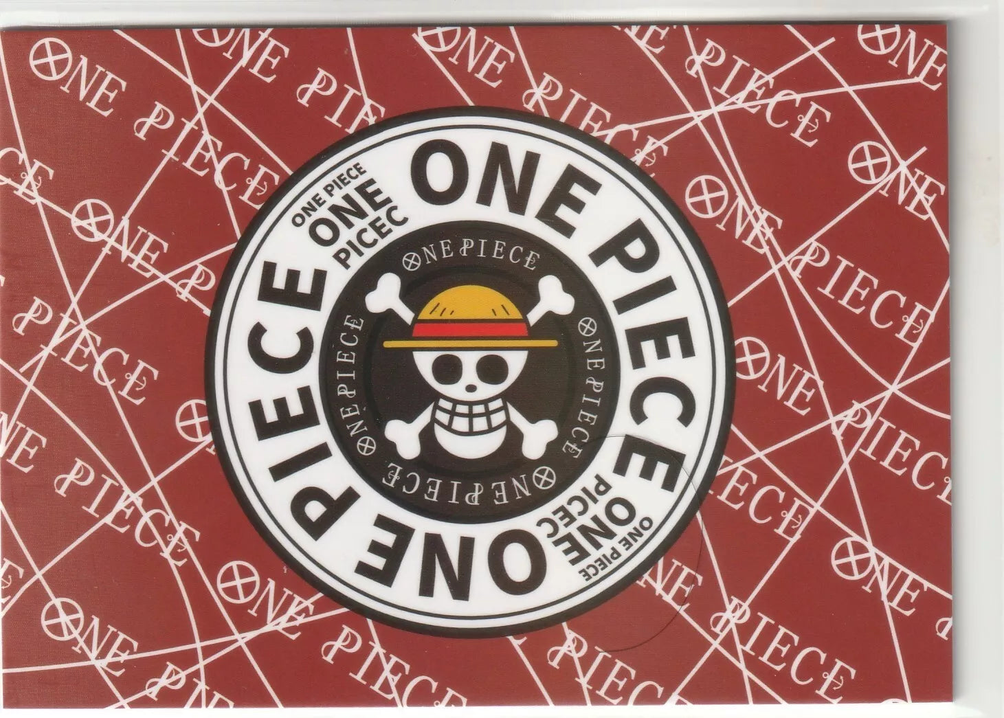  "One Piece logo on the back of CR-011 Eustass Captain Kid card with a red background and no visible wear.