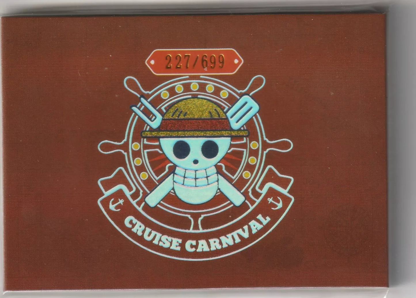 "One Piece Cruise Carnival booklet back cover featuring the Straw Hat Pirates' Jolly Roger and card number 227/699."