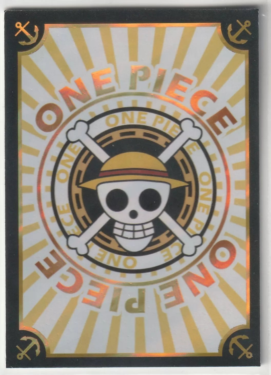  The back of the card displays the One Piece skull logo surrounded by the "ONE PIECE" text, with golden rays in the background and anchor symbols in the corners.