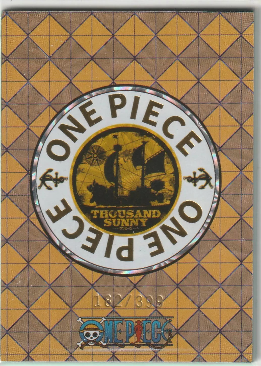 The back of an anime card featuring the One Piece logo with the Thousand Sunny ship in a golden theme and a yellow grid design, marked as 182/399.