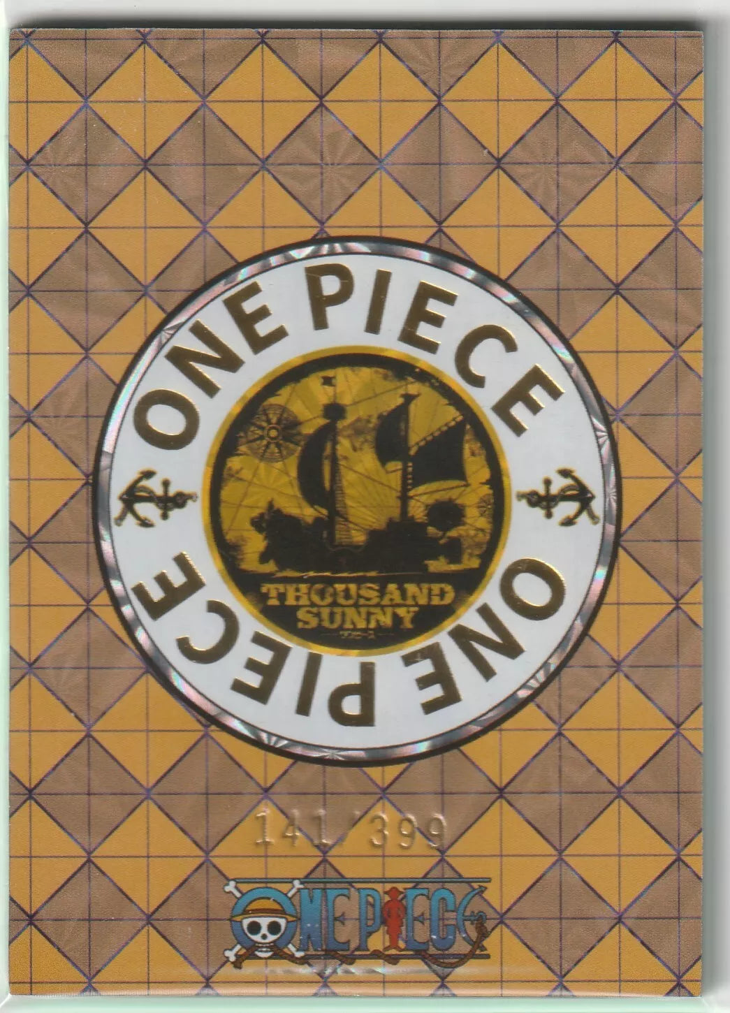 The back of an anime card featuring the One Piece logo with the Thousand Sunny ship in gold tones, marked as 141/399.

