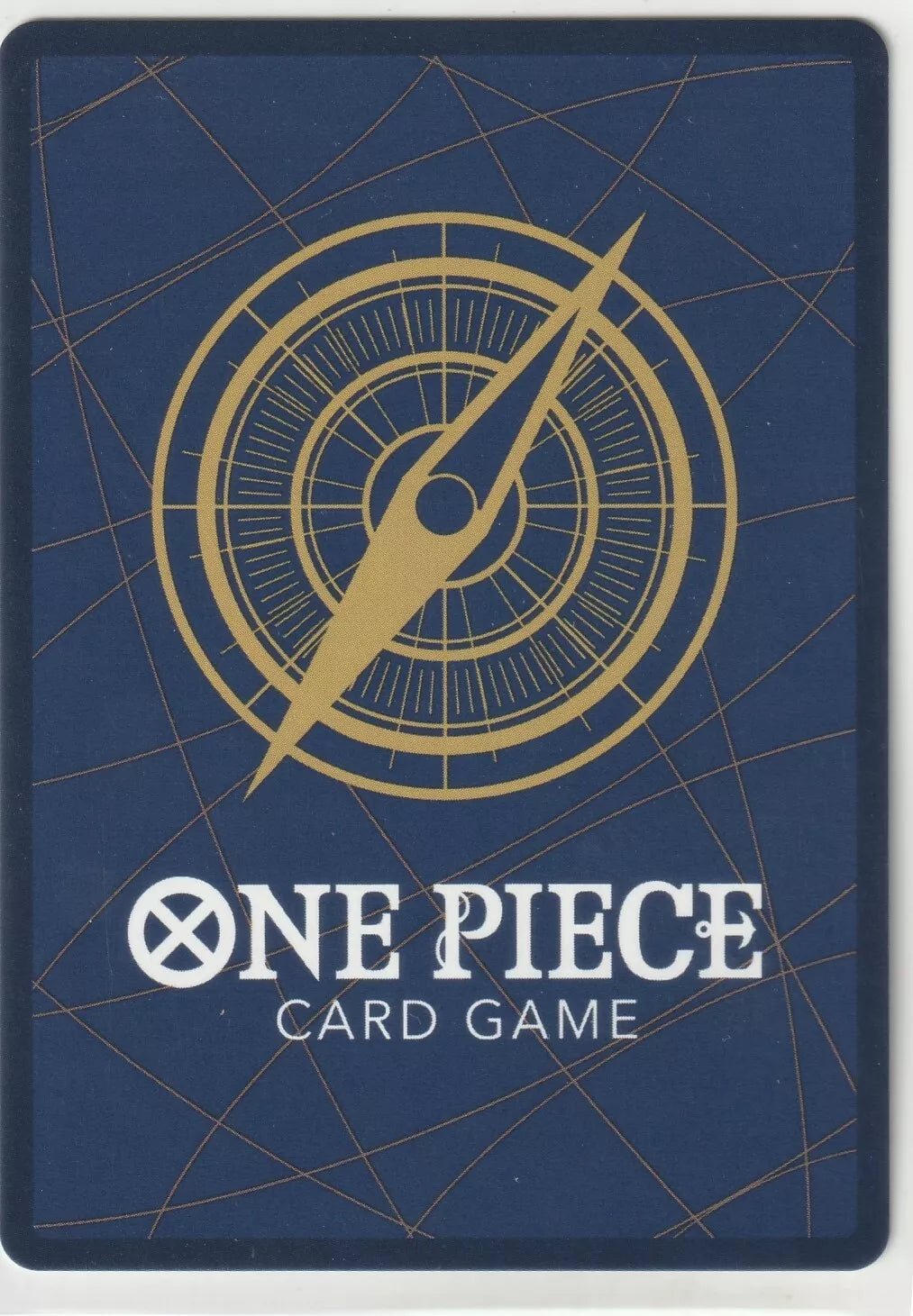 The back of a One Piece TCG card featuring a blue background, a golden compass, and the One Piece Card Game logo.

