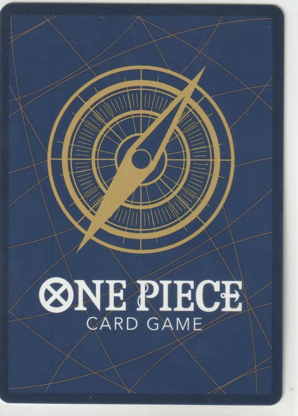 The back of a One Piece TCG card featuring a blue background, a golden compass, and the One Piece Card Game logo.