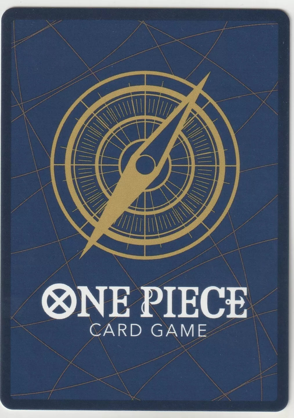 The back of a One Piece TCG card featuring a blue background, a golden compass, and the One Piece Card Game logo.