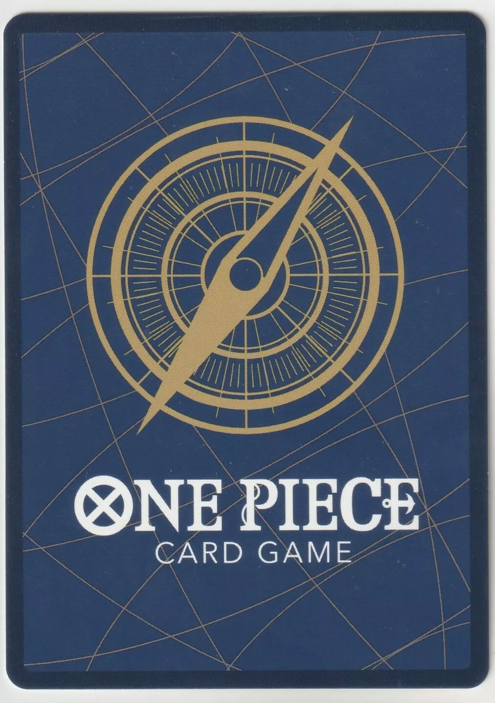 "One Piece Card Game back design with a golden compass on a navy blue background, accented by subtle gold lines."