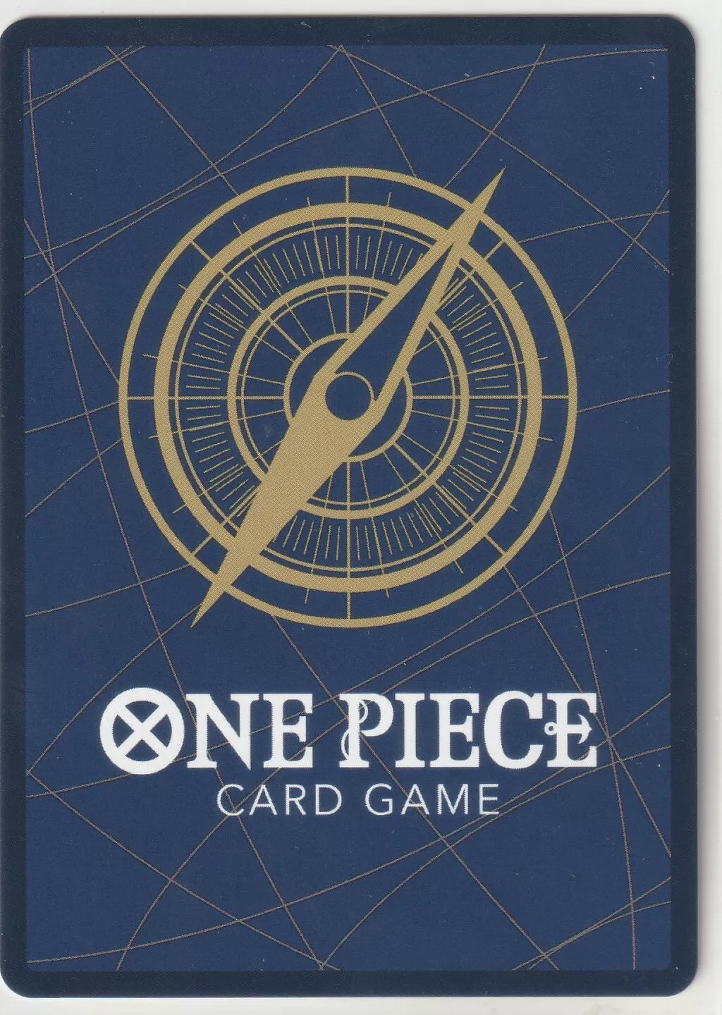 "One Piece Card Game back design featuring a golden compass on a navy blue background with subtle gold lines."