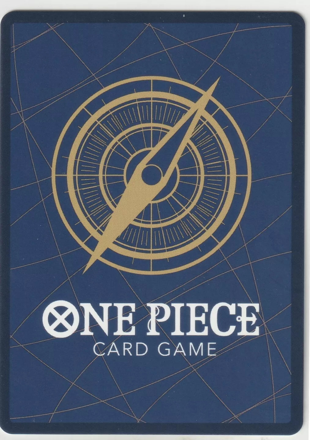 "One Piece Card Game standard back design with a golden compass on a navy blue background and subtle golden lines."