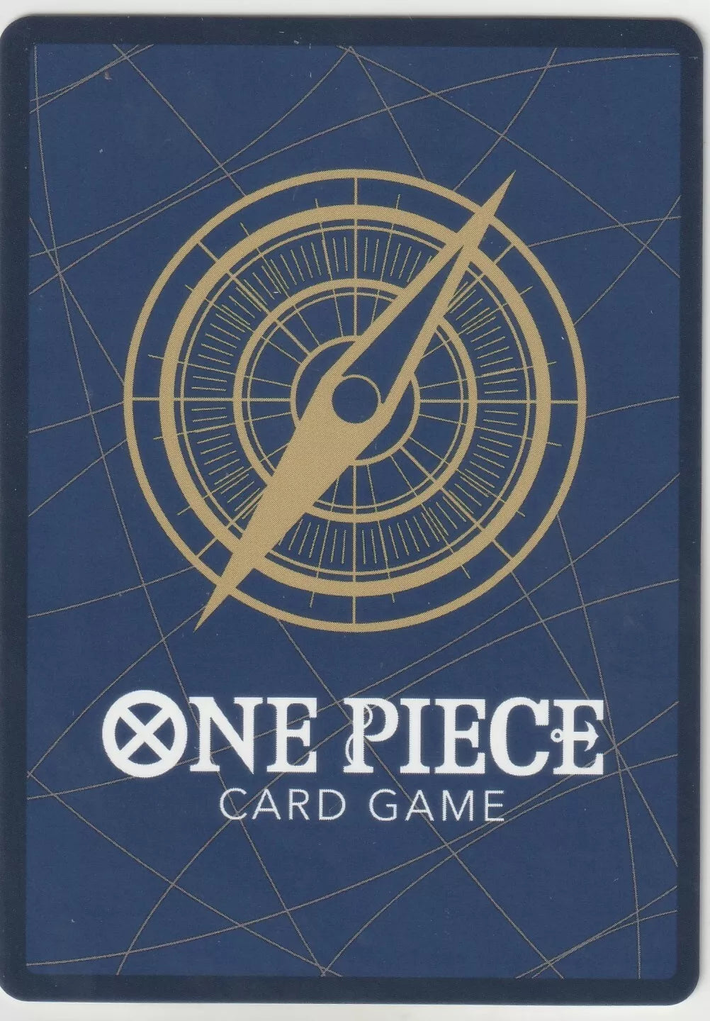 "One Piece TCG card back showing golden compass on a navy blue background with One Piece Card Game logo."