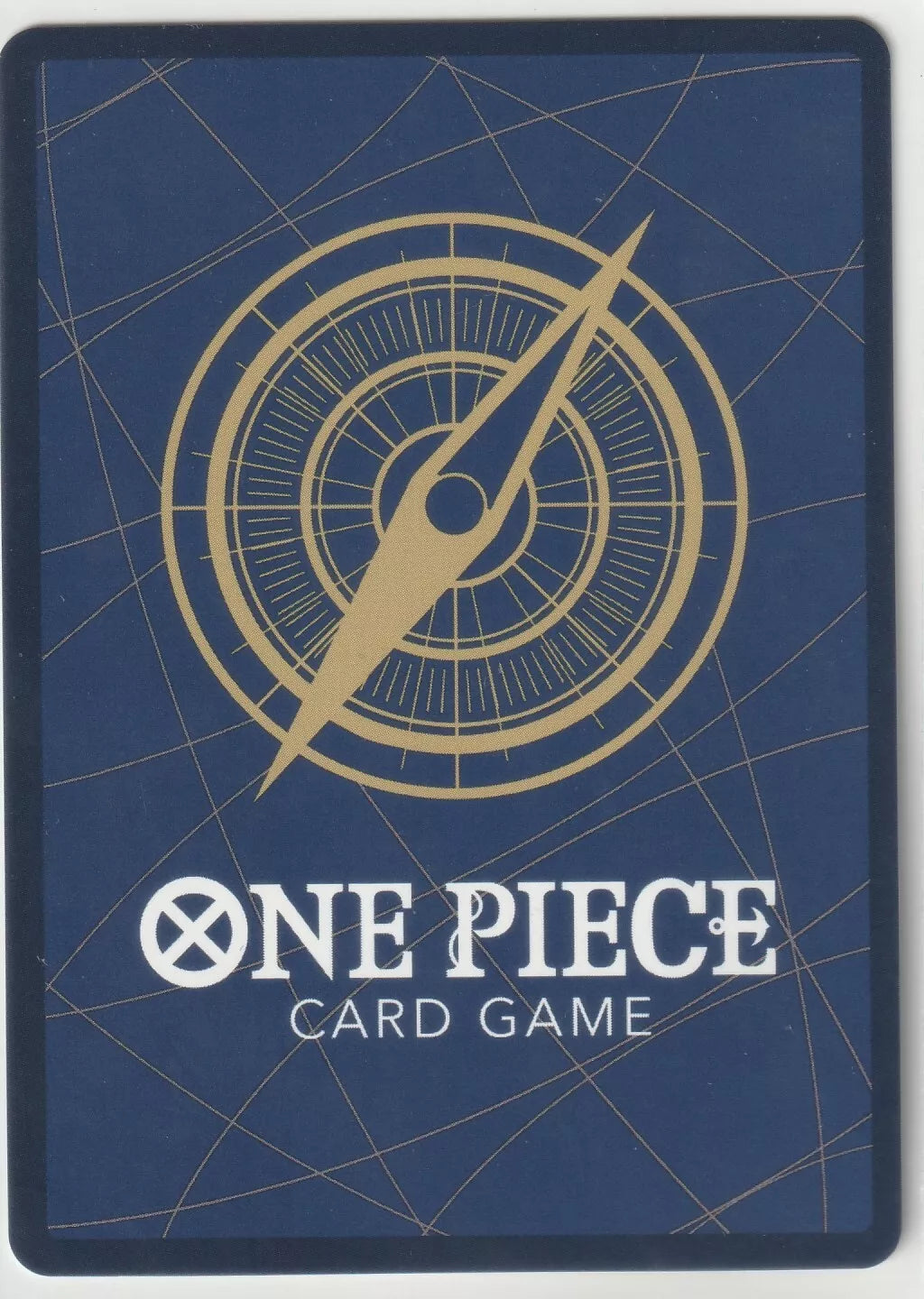 Back of a One Piece TCG card featuring a golden compass design on a deep blue background.