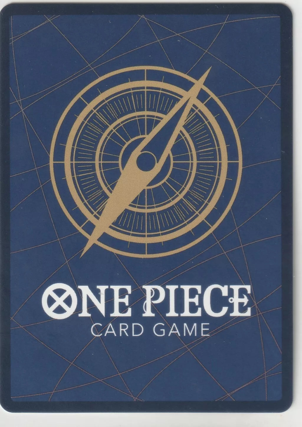 Back of a One Piece TCG card featuring a golden compass design on a blue background.