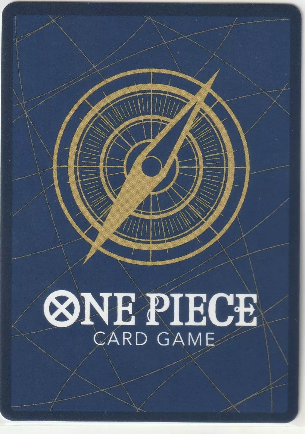 Back of a One Piece TCG card with a golden compass on a blue background.