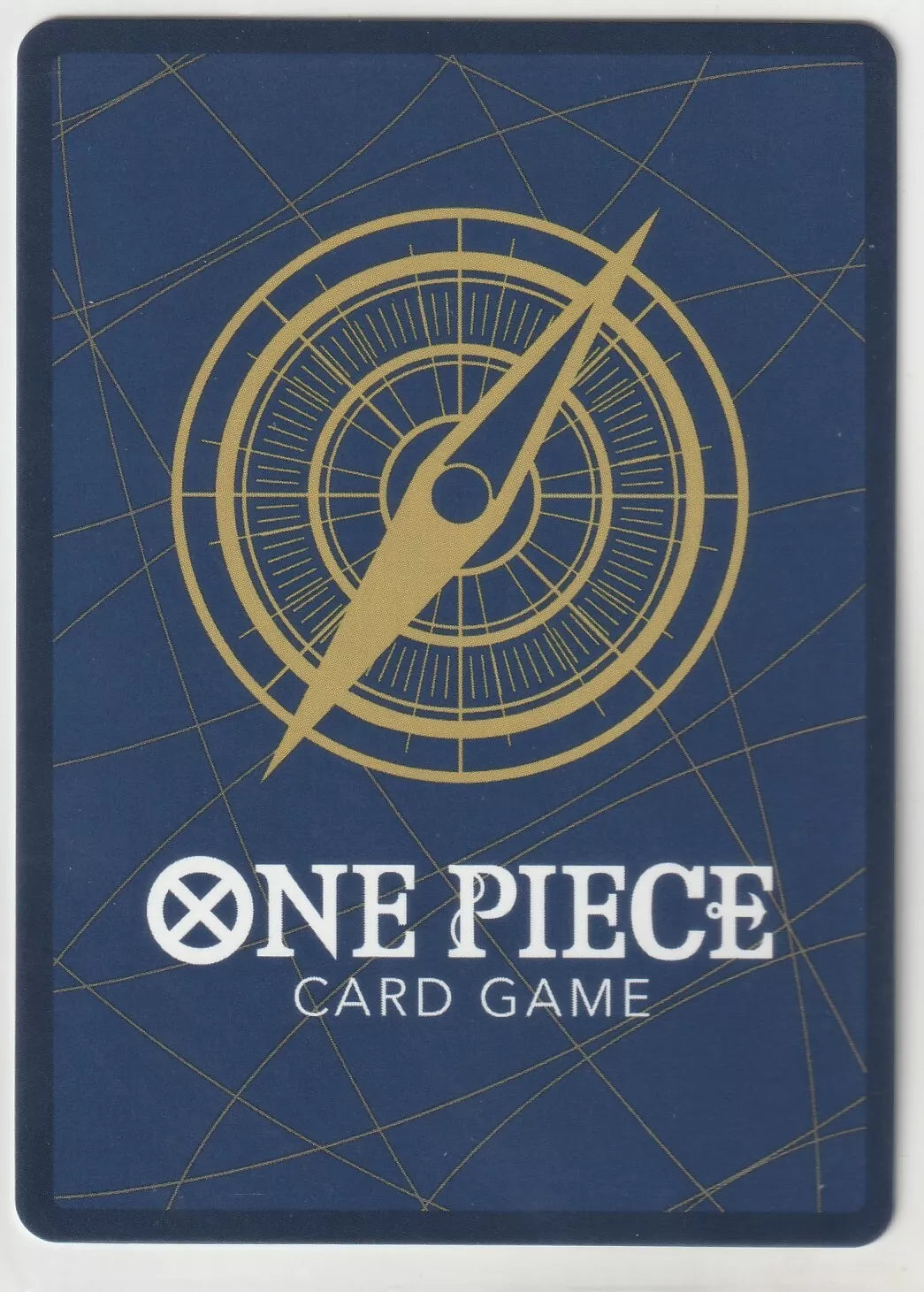 Back of a One Piece TCG card with a golden compass on a blue background.