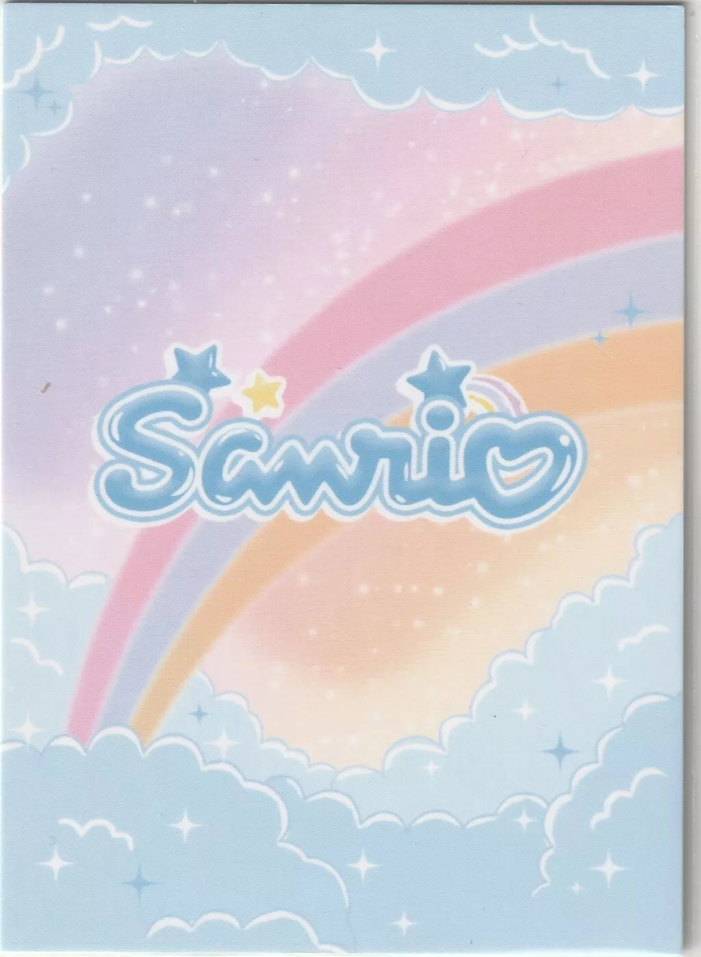 Pastel sky with fluffy clouds and a rainbow, with the Sanrio logo in the center.