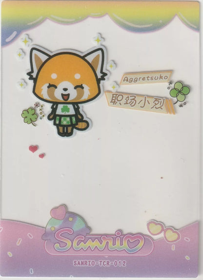 "Aggretsuko collectible card front featuring Aggretsuko in a shamrock outfit, surrounded by clovers, a rainbow, and 'Sanrio' logo at the bottom."